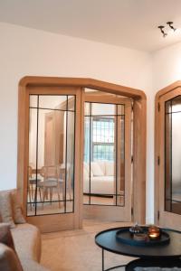 a living room with a sliding glass door at Villa Ultima Thule in Ostend