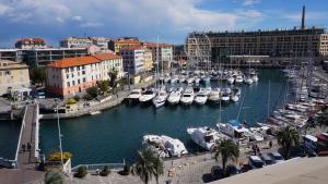 a marina filled with lots of boats in a harbor at Porto Vecchia Darsena in Savona