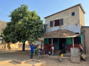 a group of people standing in front of a building at Ibel dans le pays Bassaris in Kédougou +31 photos