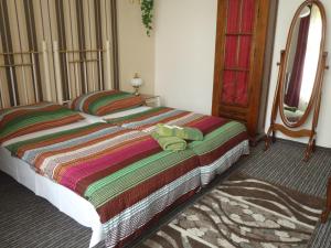 Postel nebo postele na pokoji v ubytování Hotel Green House