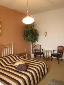 Postel nebo postele na pokoji v ubytování Hotel Green House