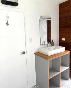 a bathroom with a sink and a mirror at Athol Country Bed & Breakfast - Entire Guest Wing in Athol +34 photos