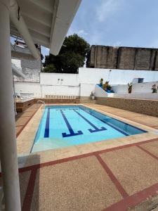 a swimming pool on top of a building at Villa Alejandro in Melgar