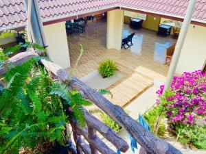 an aerial view of a resort with a pool and flowers at Hoa Rừng Homestay in Xuan An