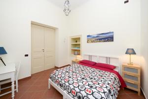 Posteľ alebo postele v izbe v ubytovaní Residenza Santa Chiara