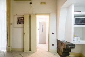 Televízia a/alebo spoločenská miestnosť v ubytovaní Residenza Santa Chiara