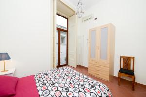 Posteľ alebo postele v izbe v ubytovaní Residenza Santa Chiara