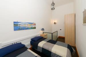Posteľ alebo postele v izbe v ubytovaní Residenza Santa Chiara