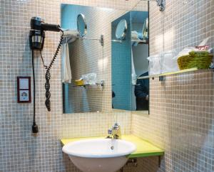 Koupelna v ubytování Hotel Tibur