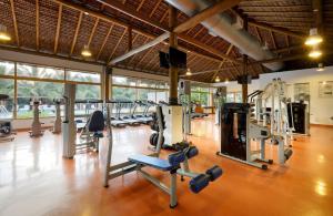 a gym with a lot of treadmills and machines at Grand Palladium Imbassaí Resort & Spa - All Inclusive in Imbassai
