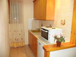 Kuchyňa alebo kuchynka v ubytovaní Vassilis Apartments