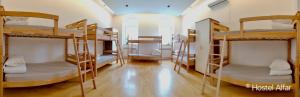 a room with a bunch of bunk beds at Hostel Alfar in Sarajevo
