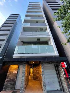 an external view of a tall building at TIC HOTEL Marunouchisakae in Nagoya