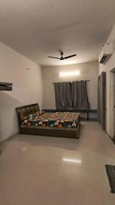 a bedroom with a bed in a room at Mist Villa in Igatpuri +9 photos