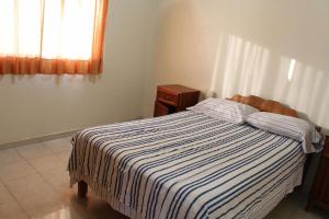 A bed or beds in a room at Family villa