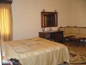 Postel nebo postele na pokoji v ubytování Hotel Etrusco