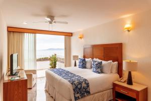 Postel nebo postele na pokoji v ubytování Grand Miramar All Luxury Suites & Residences + 37 fotografií