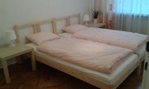 Posteľ alebo postele v izbe v ubytovaní Center Warsaw - Apartament Jana Pawła