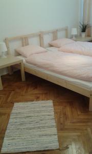 Posteľ alebo postele v izbe v ubytovaní Center Warsaw - Apartament Jana Pawła