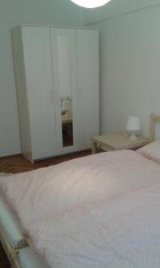 Posteľ alebo postele v izbe v ubytovaní Center Warsaw - Apartament Jana Pawła