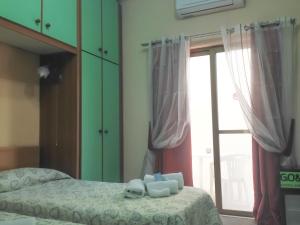 Voodi või voodid majutusasutuse D'Ambrogio Guest House toas