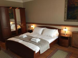 Posteľ alebo postele v izbe v ubytovaní Boutique Hotel Carpe Diem