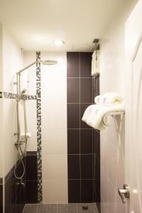 Koupelna v ubytování Unity Hotel