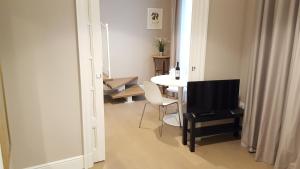 A television and/or entertainment centre at Scala Suite