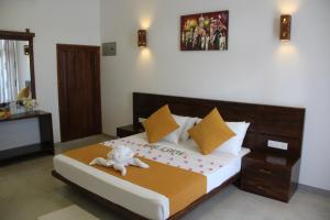 Voodi või voodid majutusasutuse Hideaway Lodge toas