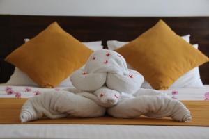 Voodi või voodid majutusasutuse Hideaway Lodge toas