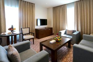 TV a/nebo společenská místnost v ubytování Samaya Hotel Deira