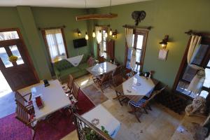 an overhead view of a living room with tables and chairs at İkiz Konaklar in Selçuk