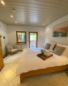 a large bedroom with a large bed in a room at Auszeit Ferienhaus Nr 2 und 2a in Sierscheid