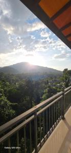 a view of a valley from a balcony at X38 Venture in Kitulgala