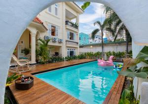 a pool in the backyard of a house at AnNam Village 4 in Vung Tau