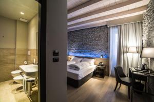 Posteľ alebo postele v izbe v ubytovaní Locanda al Vescovo & SPA