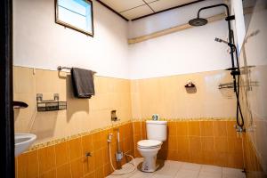a bathroom with a toilet and a sink at Zen Rise in Ko Phangan +33 photos