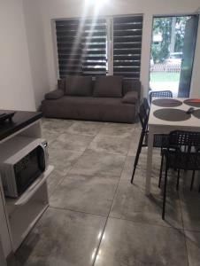a living room with a couch and a table at U Irka in Skorzęcin