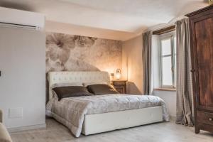 Posteľ alebo postele v izbe v ubytovaní B&b Antico Tralcio