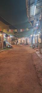 an empty room with a market at night at EVA AYURVEDIC beach hotel in Varkala