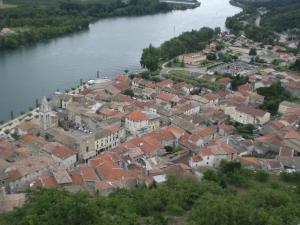 an aerial view of a town next to a river at Gîte K&C Andance in Andance