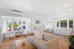 a living room with a couch and a table at Cliff View - Prime Downtown La Jolla in San Diego