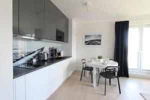 Køkken eller tekøkken på Apartamenty Perły Bałtyku