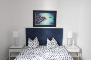 En eller flere senge i et værelse på Apartamenty Perły Bałtyku + 43 billeder