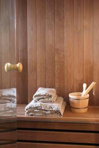 a counter with towels and a bowl on it at Beautiful chalet with views in Montgenèvre +31 photos