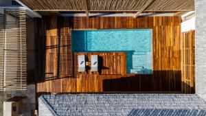 a swimming pool on the side of a building at Villa Swabrina - Grupo Messina in Jericoacoara