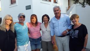 a group of people posing for a picture at Margarita Studios in Parikia