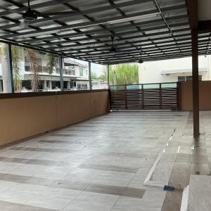 an empty building with a large room with a large ceiling at HD DOUBLE-STORY House in Banting