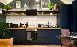 a kitchen with a sink and a counter top at The Annexe in Yeovil Junction