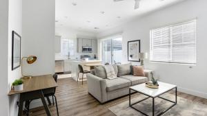 a living room with a couch and a table at Landing Incredible 2BD Gym in Phoenix